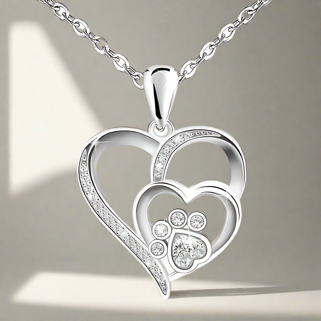 Collana in argento sterling con zampa e cuore con zirconi